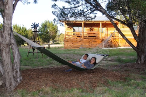 Kick back and relax in a hammock made for two under the shady trees...
