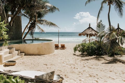 On the beach, sun loungers, beach towels