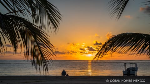 On the beach, sun loungers, beach towels