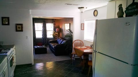Kitchen looking into Living Room. Lots of natural light.