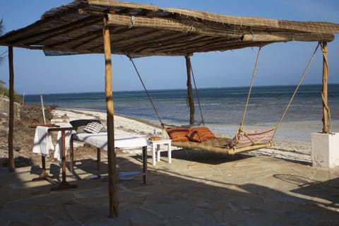 On the beach, sun loungers, beach towels