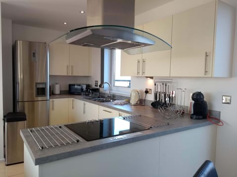 Kitchen with all the equipment you could need.