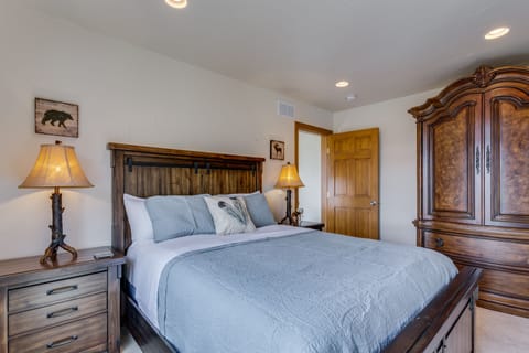 Queen Bed in Bed 5 with armoire