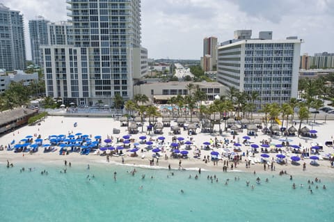 On the beach, sun loungers, beach towels