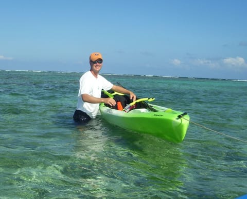 This kayak is tied at the shore while the reef awaits in the background.  We have 2 kayaks at the unit for you to use.  There is a buoy to tie up the kayaks at the reef.