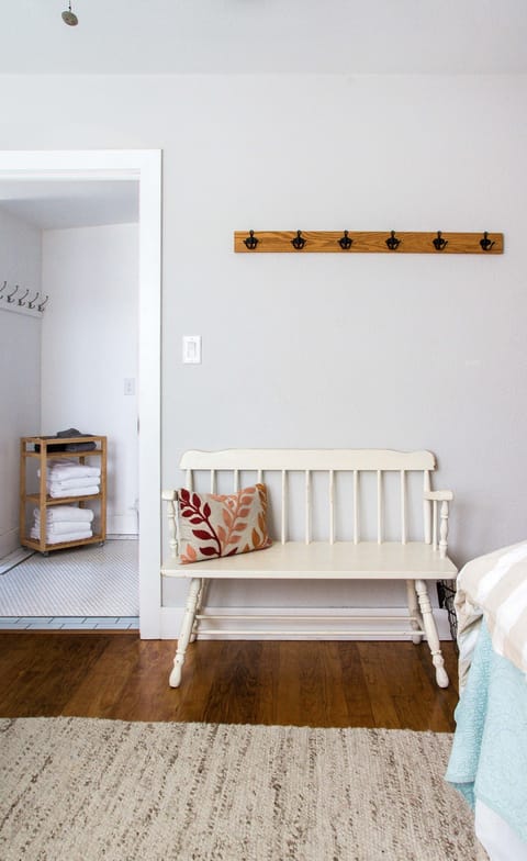 Third bedroom bench and walk through to bathroom