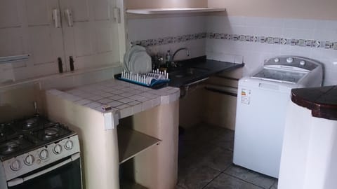 Fridge, stovetop, cookware/dishes/utensils