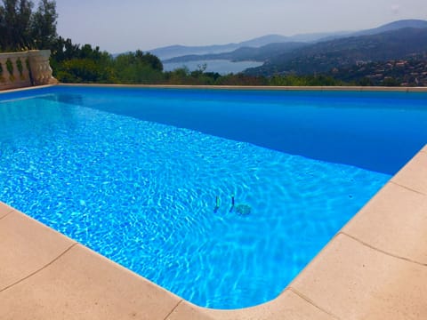 Outdoor pool, a heated pool, sun loungers