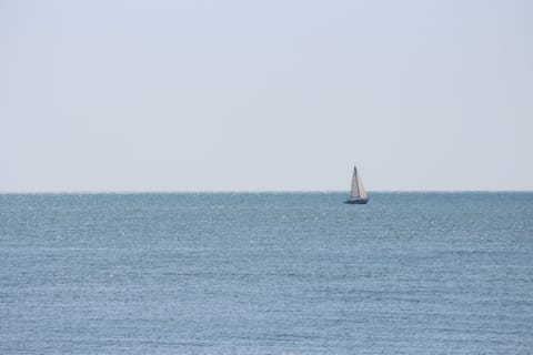 On the beach, sun loungers, beach towels