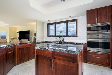 Upper chefs kitchen with a view