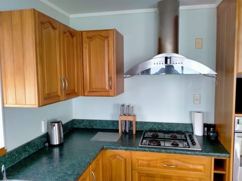 Kitchen with gas hob and wall oven