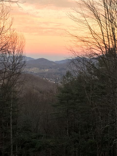 Relax around the fire pit and see the twinkling lights from the city below