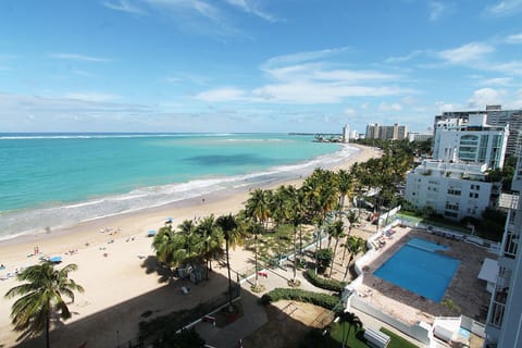 On the beach, sun loungers, beach towels