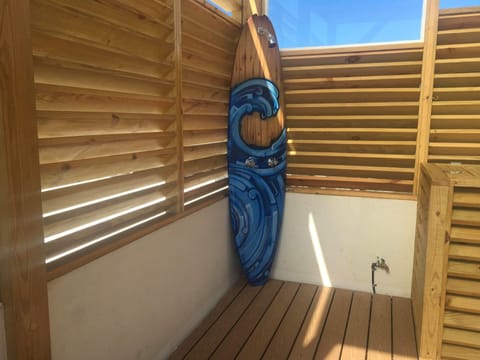 Surfboard shower on roof top deck - keep coo; while sunning