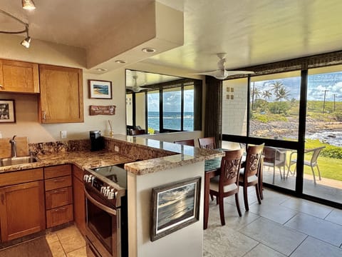 The view from the newly renovated kitchen is spectacular - the ocean calls!
