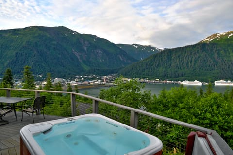 Relax while soaking in the hot tub and enjoying the million dollar view.