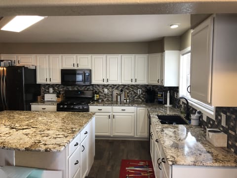 new kitchen and island that seats 5