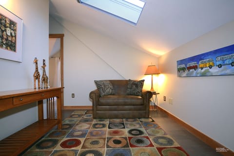Enjoy a nice book in the upstairs loft by the master bedroom