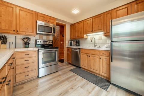 Well Equipped Kitchen / Stainless Appliances / New Wood Floor