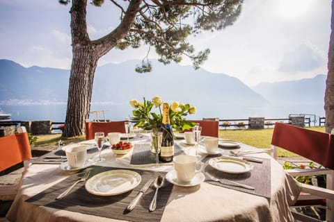 Dine alfresco and take in the spectacular views here at "Darsena Ossuccio"
