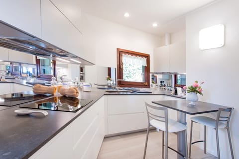 Rustle up an Italian feast in the modern kitchen here at "Darsena Ossuccio"