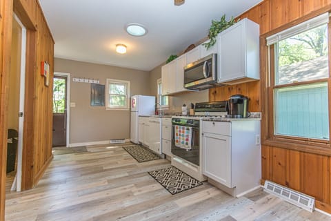 The kitchen has a Keurig, coffee maker, waffle maker, blender, crock pot + more!