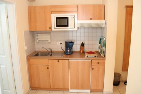 Fridge, microwave, dishwasher, coffee/tea maker