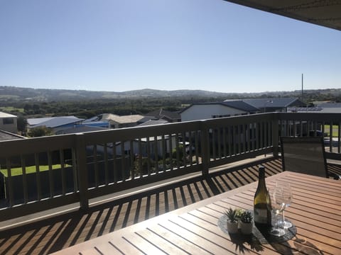 Protected undercover deck with awesome views. Pass the wine! 