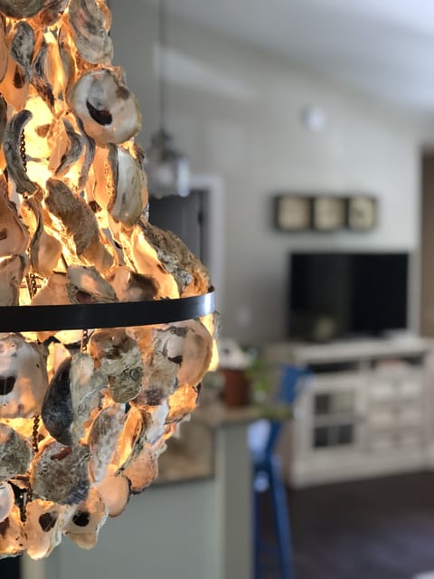 Unique treasures like the oyster shell chandelier adorn our home.