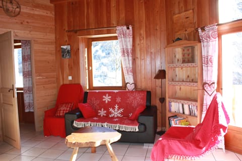 Living area | TV, fireplace, books