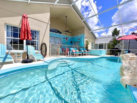 Outdoor pool, a heated pool, pool umbrellas