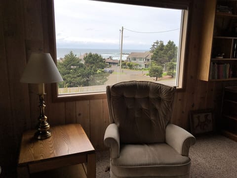 Easy chair in family room- Oceanview behind.