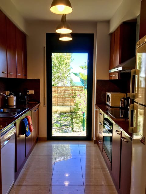 Kitchen with views and access to the private garden