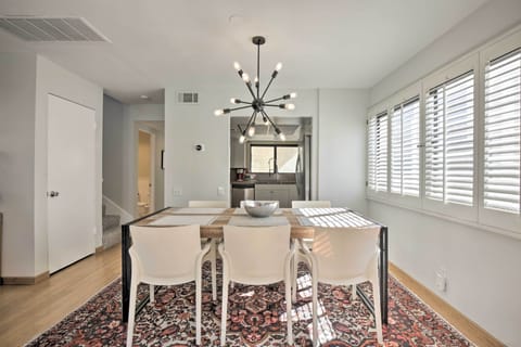 The dining table is just steps from the kitchen.