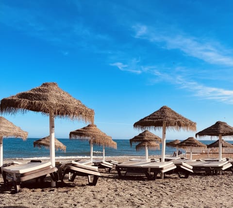 Beach nearby, sun loungers