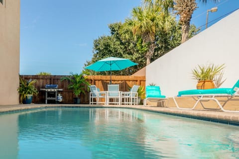 Swim under the Palm trees in the refreshing Private Pool, large Patio area