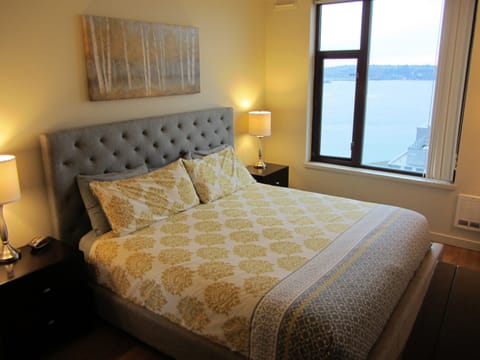 King bed in primary en suite with wonderful water views