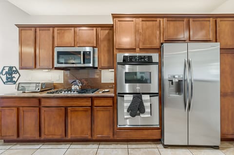 The kitchen is fully equipped with everything you need to make cooking a breeze.