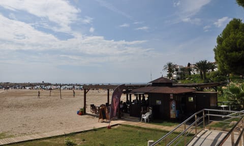 Beach nearby, sun loungers