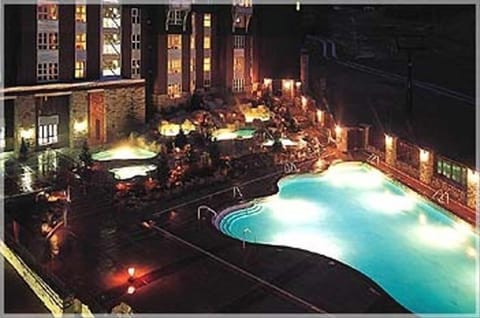View of heated pool at night.  