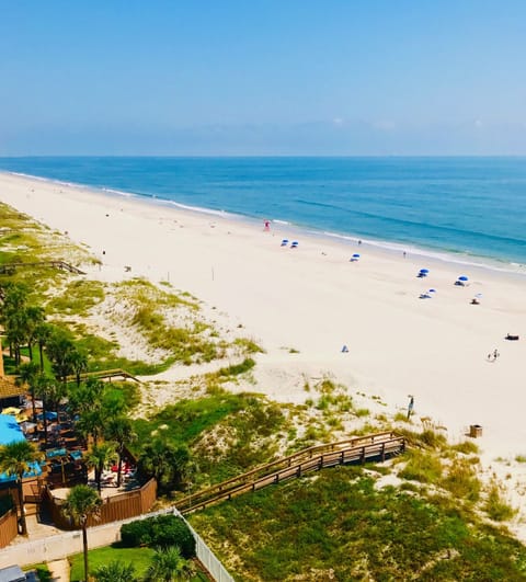 On the beach, sun loungers, beach towels