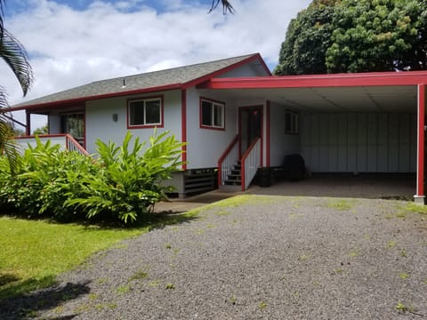 Palm Cottage and attached carport
