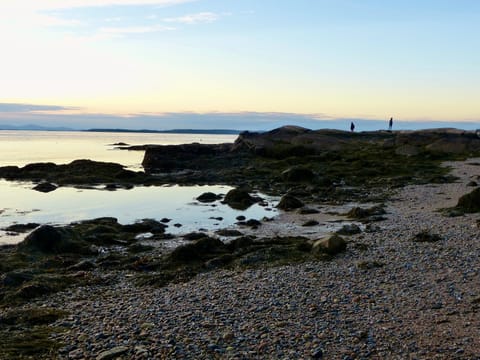 On the beach, sun loungers, beach towels