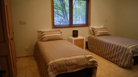 Views of brook and duck pond. Bedroom setup as twin beds, can be rearranged.