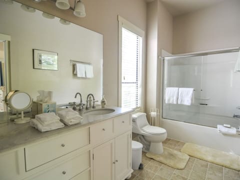 Combined shower/tub, hair dryer, towels, soap