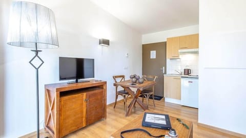 Relax in the living area and watch a show on the TV.