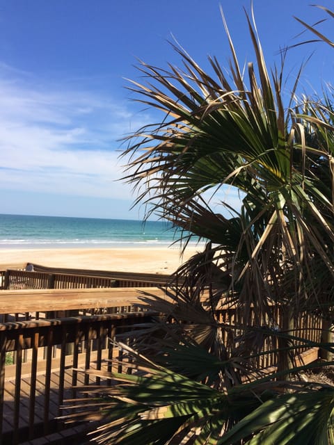 On the beach, sun loungers, beach towels