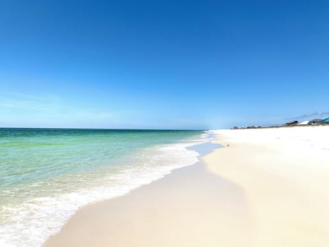 On the beach, sun loungers, beach towels