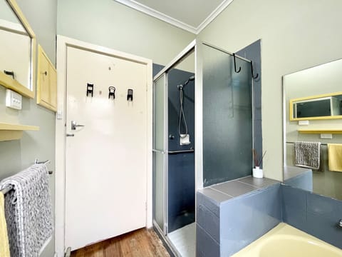 Combined shower/tub, hair dryer, towels, soap