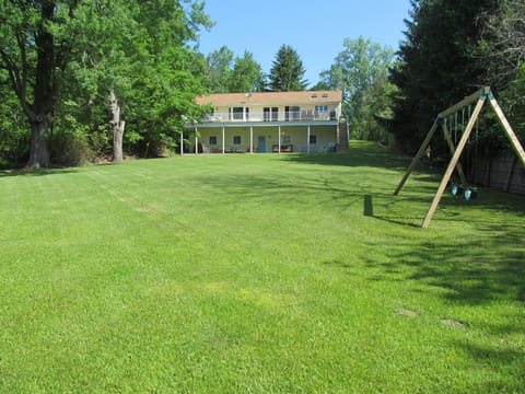 The well maintained yard is spacious with lots of room for kids to run and play.